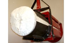 Polvo compactado en sistema de compactador de tornillo